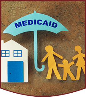 Paper cutouts of family, Medicaid umbrella, and home