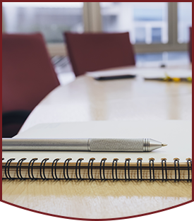 Conference room with notebook on table